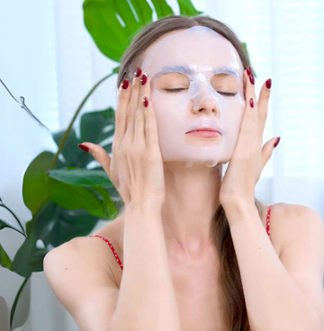 Soft bio-cellulose sheet mask hugging facial contours for smooth skin feel